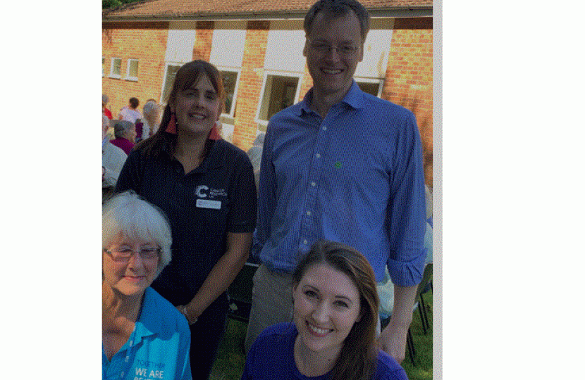 Michael Tomlinson MP attending Cancer Research Strawberry Tea