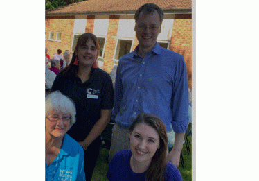 Michael Tomlinson MP attending Cancer Research Strawberry Tea